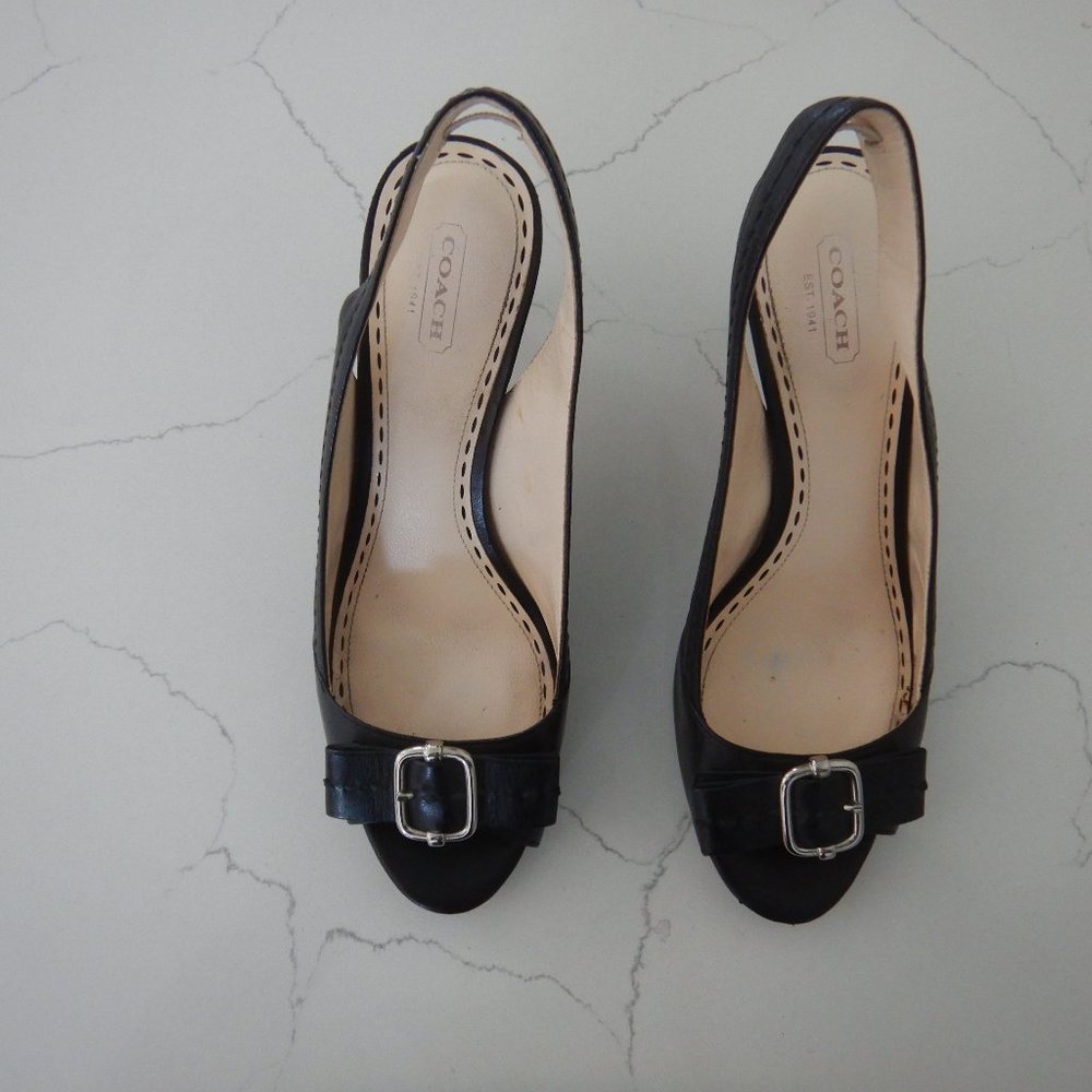 Coach black leather slingback shoes.